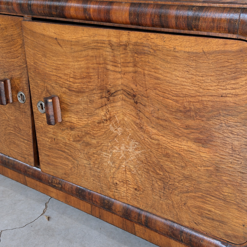 Art Deco walnut sideboard side and trim detail
