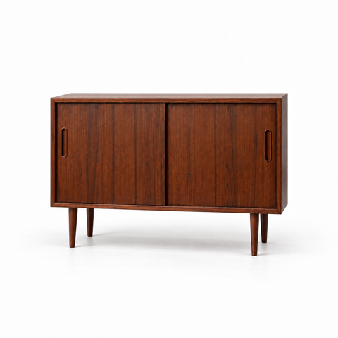 Compact rosewood sideboard by Carlo Jensen on white background