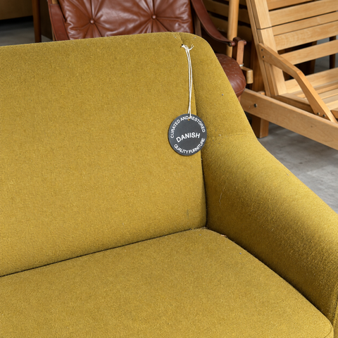 Vintage Danish curved upholstered sofa — upholstery and condition detail