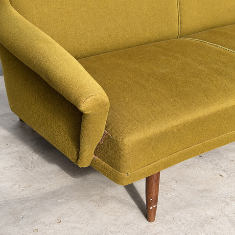 Vintage Danish curved upholstered sofa — upholstery and condition detail