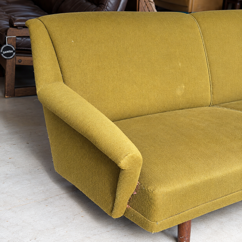 Vintage Danish curved upholstered sofa — upholstery and condition detail