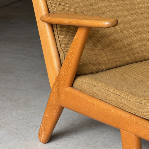 Mustard FDB lounge chair — arm and frame detail