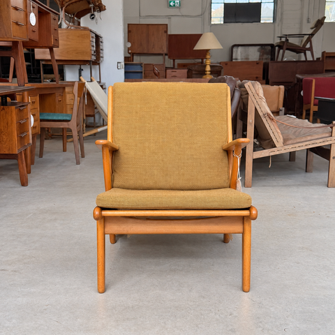 Mustard FDB lounge chair — 03-1458