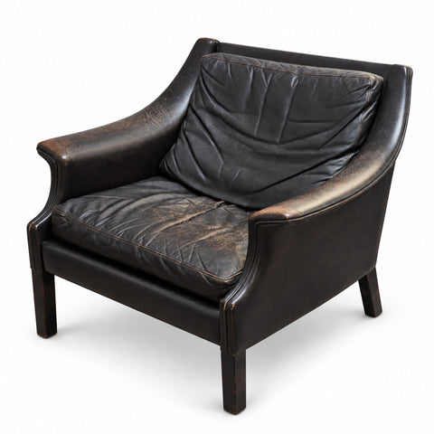 Vintage Low-Back Leather Lounge Chair by Aage Christiansen — white background with soft shadow