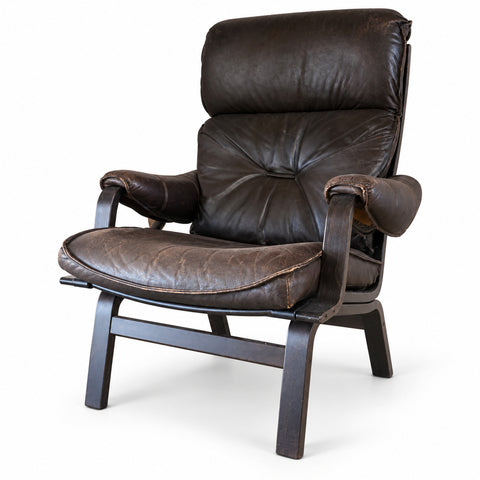 Vintage Leather Lounge Chair — white background with soft shadow