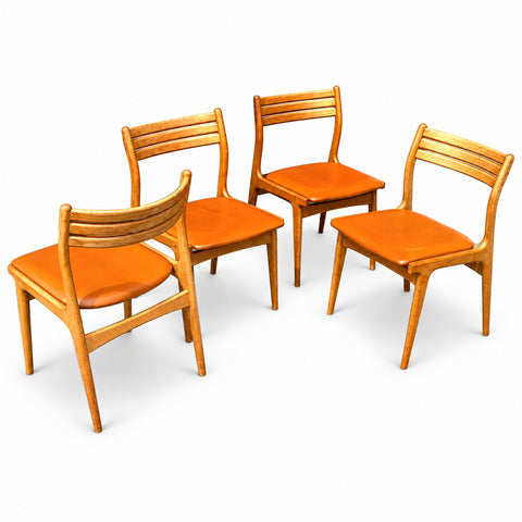 Set of 4 Vintage Dining Chairs by Johannes Andersen — white background with soft shadow