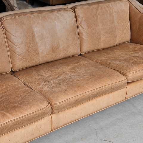 Frederik A. Kayser tan leather sofa — showroom view 5