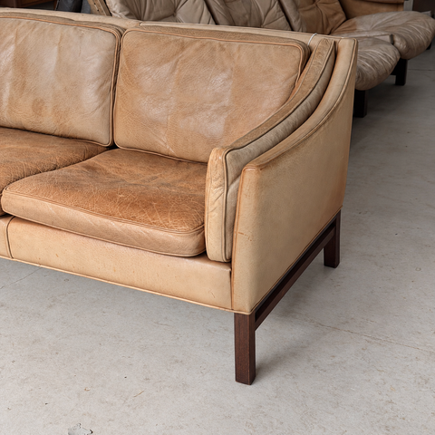 Frederik A. Kayser tan leather sofa — showroom view 6