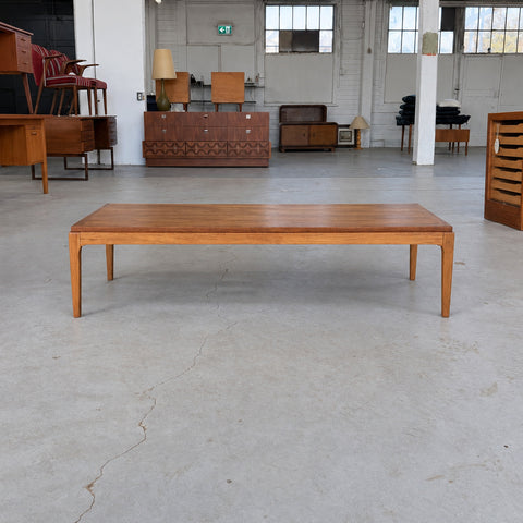 Walnut and elm coffee table by Lane — straight-on view
