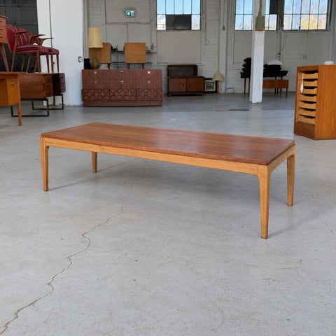 Walnut and elm coffee table by Lane — angled view