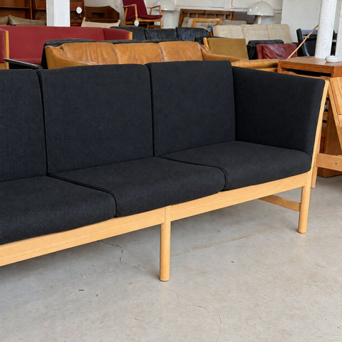 Black Upholstered Oak Sofa — view 4