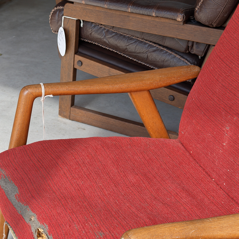Red Alf Svensson lounge chair — arm and upholstery detail