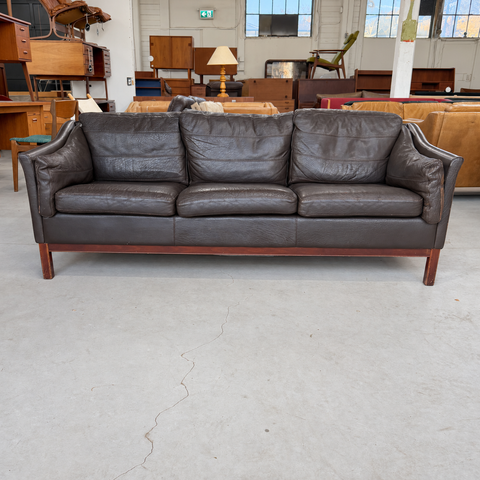 Stouby dark leather three-seater sofa — full front view